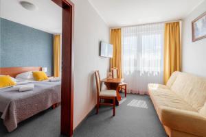 Postel nebo postele na pokoji v ubytování ALKA Sun Resort