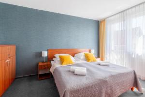 Postel nebo postele na pokoji v ubytování ALKA Sun Resort