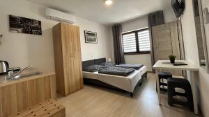 Ένα ή περισσότερα κρεβάτια σε δωμάτιο στο Na Fali