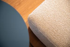 a close up of the corner of a couch at Cala Ponte, a Tribute Portfolio Hotel in Polignano a Mare