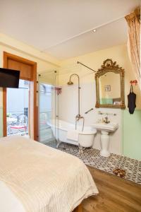 Postel nebo postele na pokoji v ubytování The Elliot Boutique - Aparthotel
