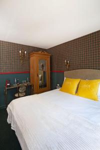 Postel nebo postele na pokoji v ubytování The Elliot Boutique - Aparthotel
