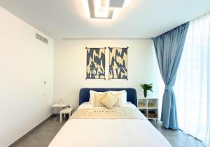 Postel nebo postele na pokoji v ubytování Unique 1BR in Stella Maris,City View,Dubai Marina