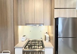 Kuchyň nebo kuchyňský kout v ubytování Unique 1BR in Stella Maris,City View,Dubai Marina