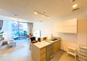 Kuchyň nebo kuchyňský kout v ubytování Unique 1BR in Stella Maris,City View,Dubai Marina
