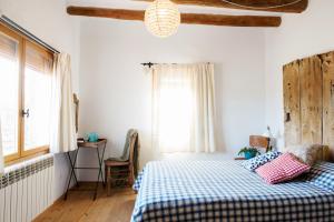 Posteľ alebo postele v izbe v ubytovaní Casa Les Germanes + 37 fotografií