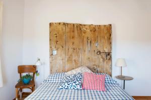 Cama o camas de una habitación en Casa Les Germanes