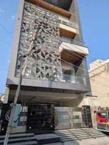 a building under construction with stairs in front of it at Ishwar Bharti Apartments in Hisār