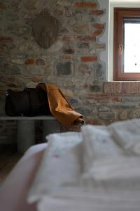 Postel nebo postele na pokoji v ubytování Il Sassello