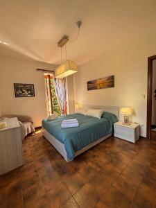 En eller flere senge i et værelse på Casa Sanremo + 6 billeder