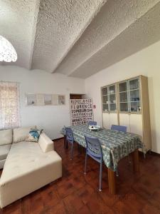 En eller flere senge i et værelse på Casa Sanremo