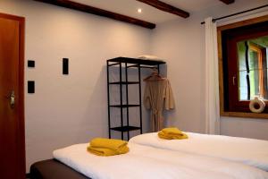 Postel nebo postele na pokoji v ubytování Haus Bergfried