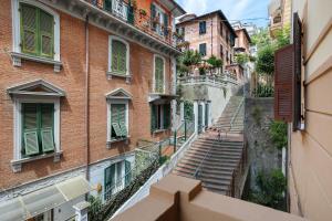 an alley with stairs in an old building at La casa di Licia in La Spezia