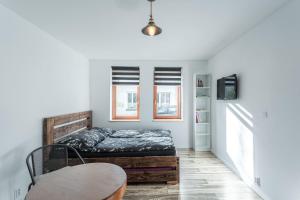 Postel nebo postele na pokoji v ubytování Apartmány 178