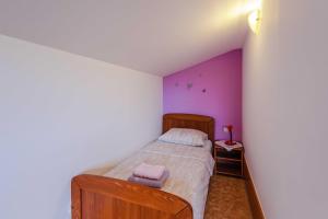 Postel nebo postele na pokoji v ubytování Apartments Rose