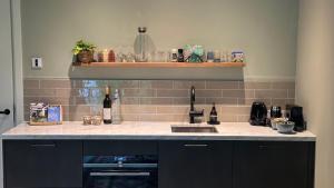 Kuchyň nebo kuchyňský kout v ubytování Luxe B&B "In de Schulp", ontspan en geniet van comfort en stijl
