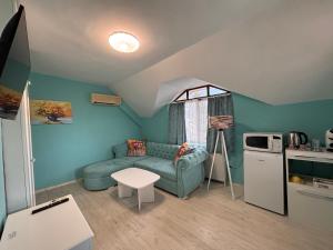 A kitchen or kitchenette at Sozopol Romance Apartments