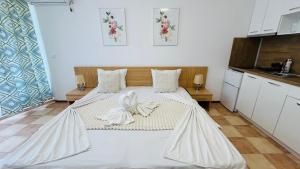 Postel nebo postele na pokoji v ubytování KAYA Atelie 1 Sunny Beach