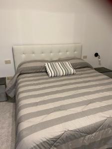 Postel nebo postele na pokoji v ubytování JhonathanB&B