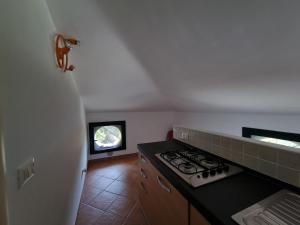 Kuchyň nebo kuchyňský kout v ubytování Rodi Garganico - Appartamento