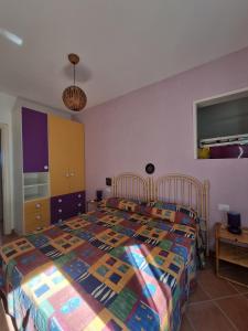 Postel nebo postele na pokoji v ubytování Rodi Garganico - Appartamento
