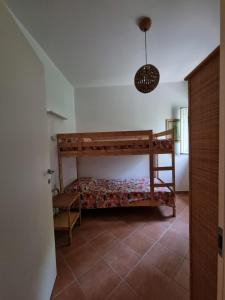 Postel nebo postele na pokoji v ubytování Rodi Garganico - Appartamento