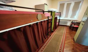 Postel nebo postele na pokoji v ubytování Kefir & Bun Hostel