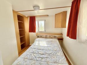 Postel nebo postele na pokoji v ubytování Amapolas - Villaggio & Camping
