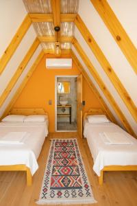 Postel nebo postele na pokoji v ubytování Nest Beach Bungalows Datça
