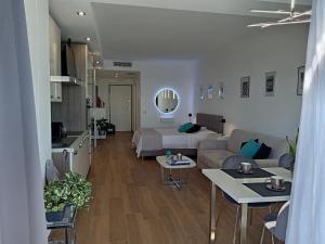 Ruang duduk di SUITE CONTI 36 terrazza sul mare