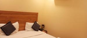Postel nebo postele na pokoji v ubytování AB Hotel - Amar International by Sarthak - Local ID not accepted