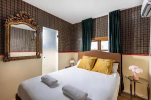Postel nebo postele na pokoji v ubytování The Elliot Boutique - Aparthotel