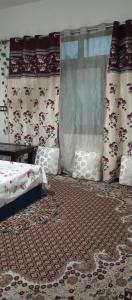 Postel nebo postele na pokoji v ubytování Pine Guest House sawan tangmarg