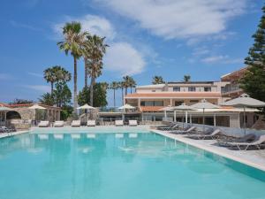 The swimming pool at or close to Atlantica Thalassa Hotel