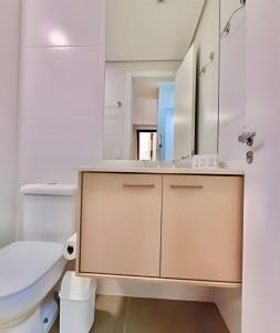 a bathroom with a sink and a toilet at Fantastic, Studio com Ar Cond. e Wi-fi in Curitiba +37 photos