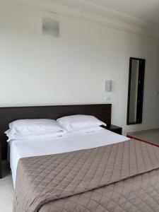 Postel nebo postele na pokoji v ubytování Union Park Hotel