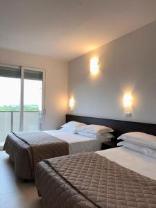 Postel nebo postele na pokoji v ubytování Union Park Hotel