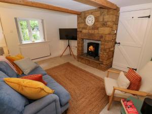 Et tv og/eller underholdning på Woodman's Cottage