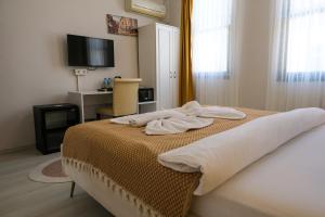 Φωτογραφία από το άλμπουμ του Garden Palace Boutique Hotel στο Κουσάντασι