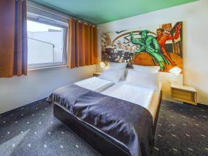 Postel nebo postele na pokoji v ubytování B&B Hotel Leipzig-City