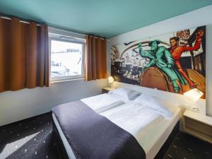 Postel nebo postele na pokoji v ubytování B&B Hotel Leipzig-City