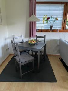 Posezení v ubytování Ferienwohnung Am Wald