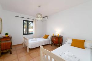 Posteľ alebo postele v izbe v ubytovaní Villa Palm View by Villa Plus + 15 fotografií