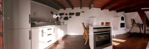Kuchyň nebo kuchyňský kout v ubytování Casa Rural El Refugio + 37 fotografií