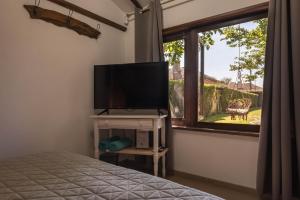 Μια τηλεόραση ή/και κέντρο ψυχαγωγίας στο Villa Viara
