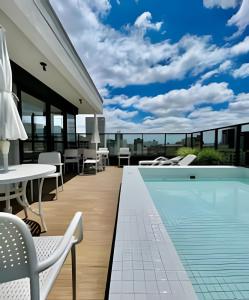 Πισίνα στο ή κοντά στο Studio SOFISTiCADO, Clean c/ Ar Condicionado