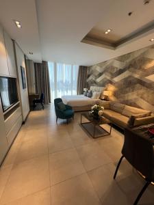 Cozy Stay tesisinde bir televizyon ve/veya eğlence merkezi
