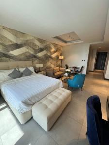 Cozy Stay tesisinde bir odada yatak veya yataklar