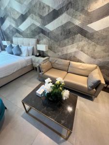 Cozy Stay tesisinde bir odada yatak veya yataklar