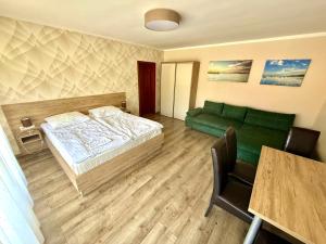 Posteľ alebo postele v izbe v ubytovaní See Vendégház - Siófok + 29 fotografií